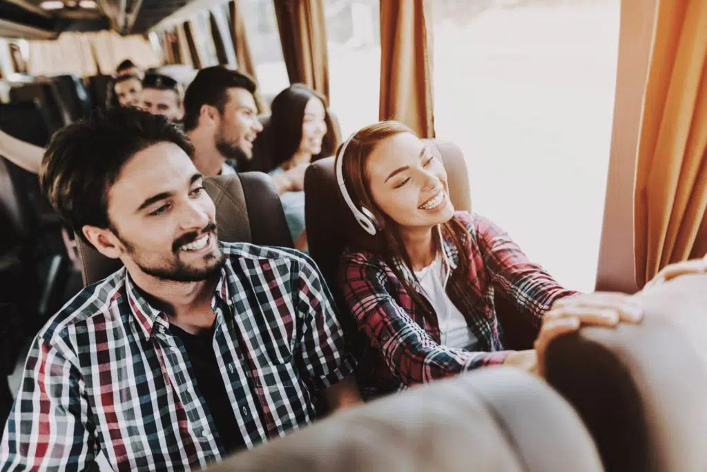 group traveling on bus